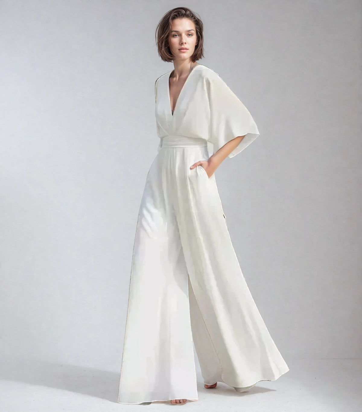 Tuta fluida con maniche a farfalla da donna